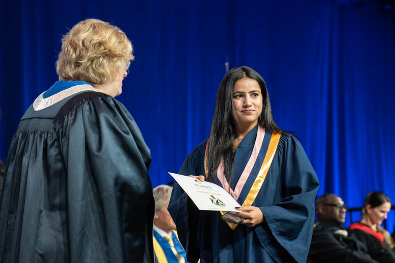 Student receiving diploma