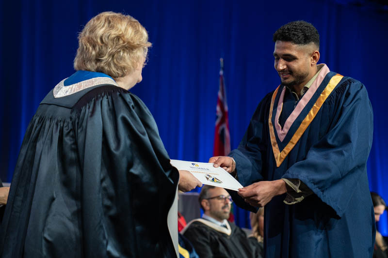 Student receiving diploma