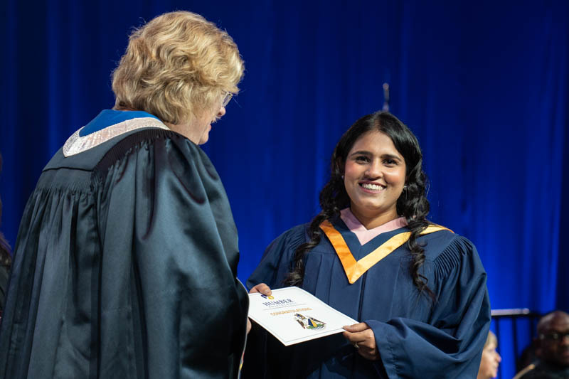 Student receiving diploma