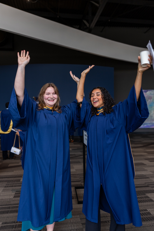 Students with their hands up