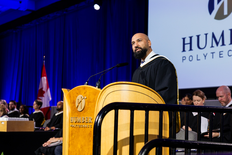Humber Staff talking on podium