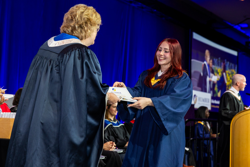 Student receiving document