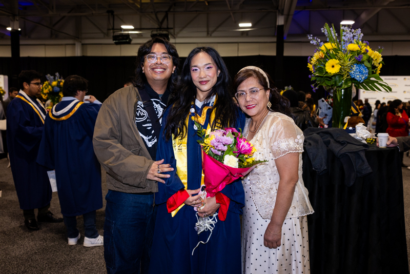 Student and Family with flowers