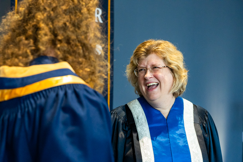 Humber President talking with student