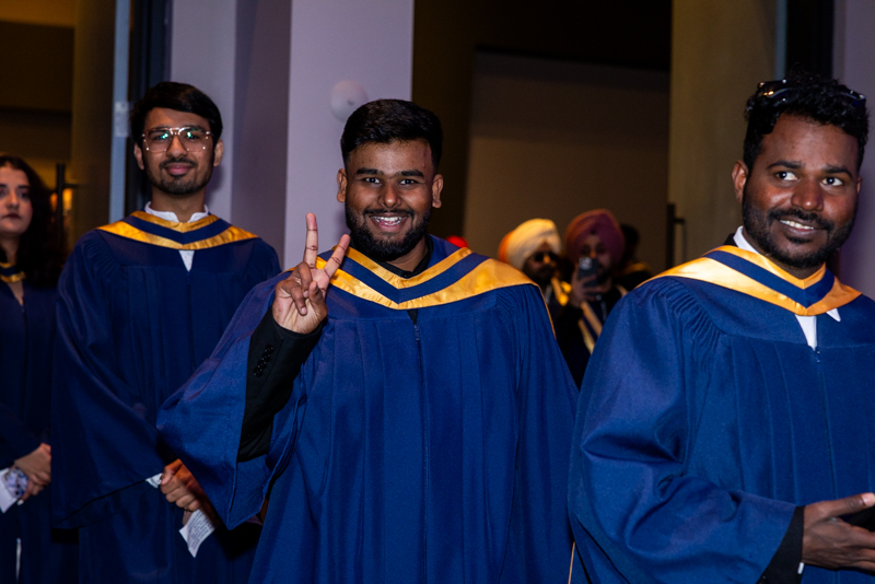 Students smiling in line