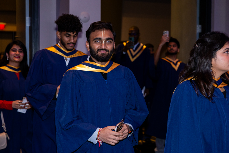 Students smiling in line