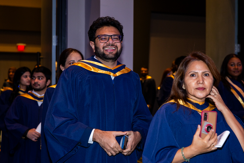 Students smiling in line