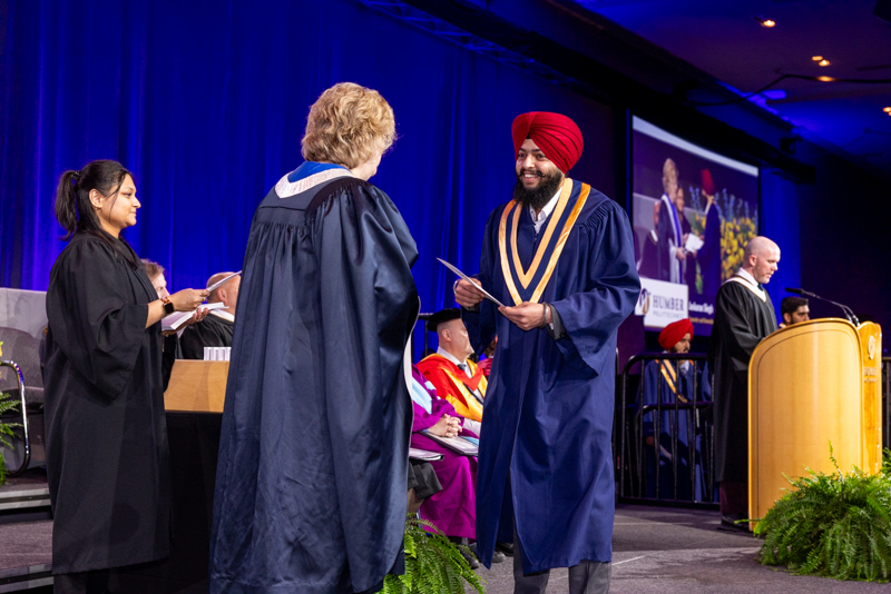 Student receiving diploma