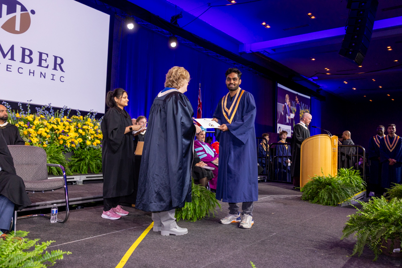 Student receiving diploma