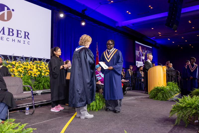 Student receiving diploma