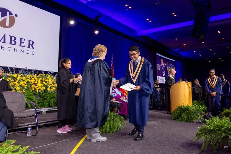 Student receiving diploma