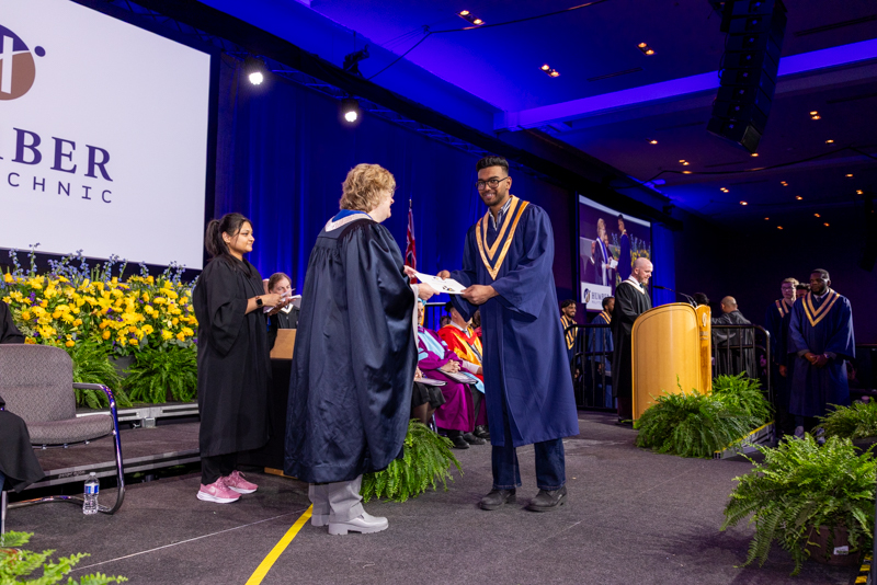 Student receiving diploma