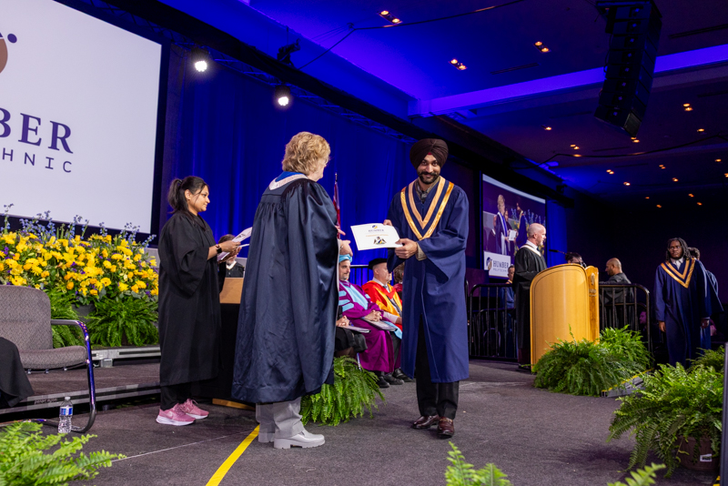Student receiving diploma