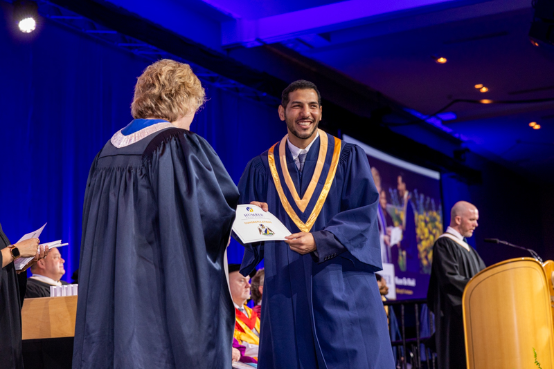 Student receiving diploma
