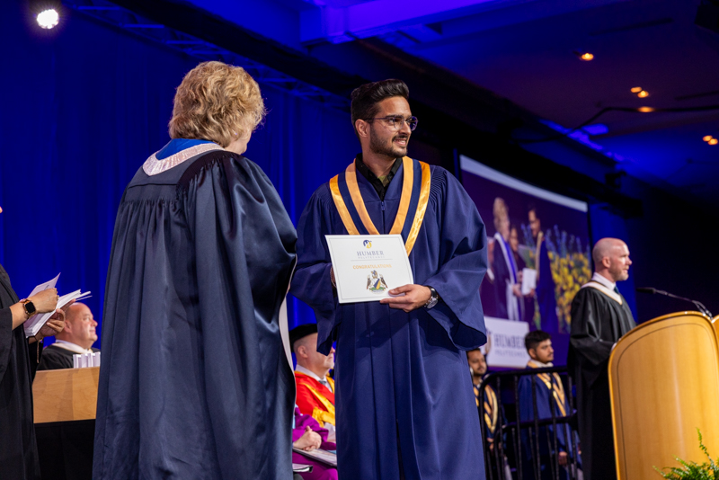 Student receiving diploma
