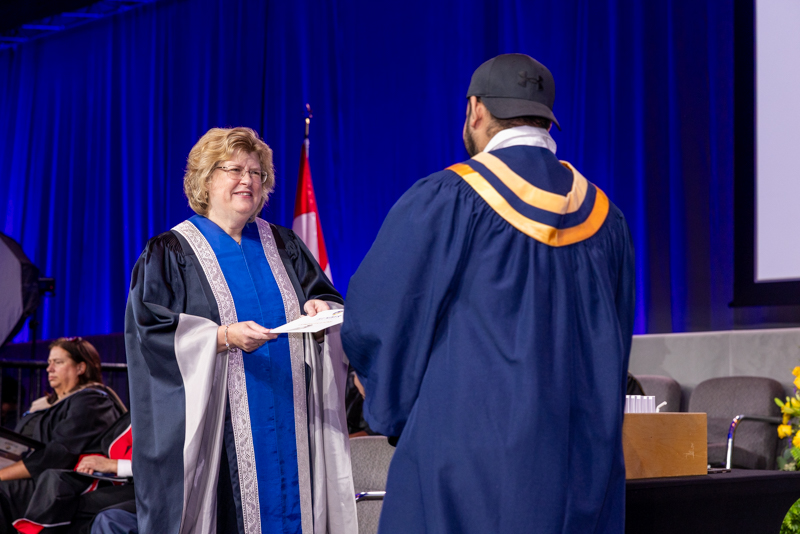 Humber President giving diploma
