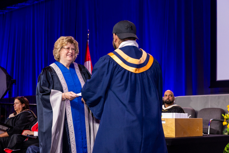 Humber President giving diploma