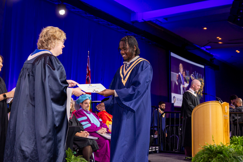 Humber President giving diploma