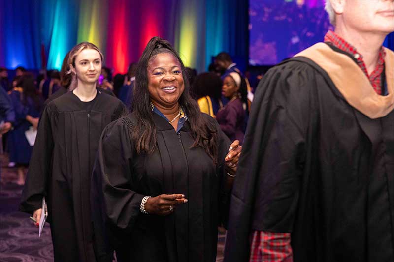 People smiling at the ceremony