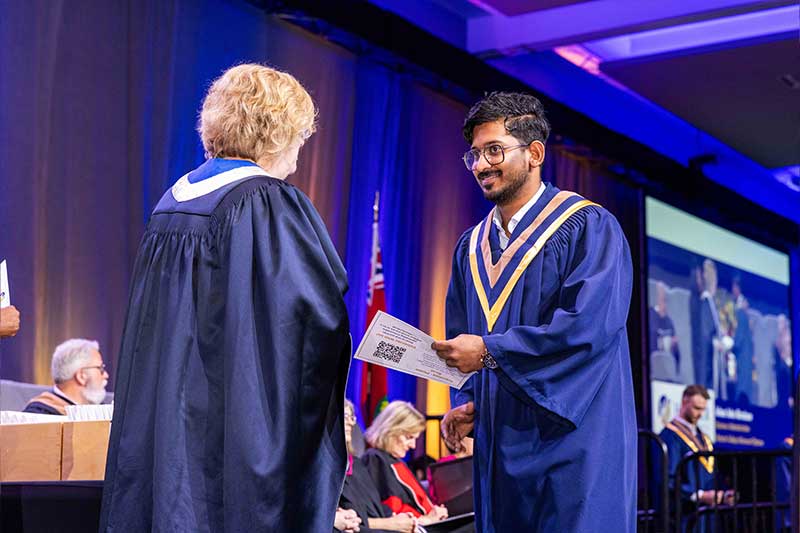 Student receiving diploma