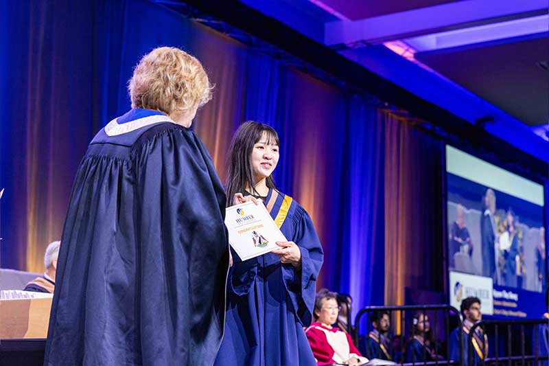 Student receiving diploma