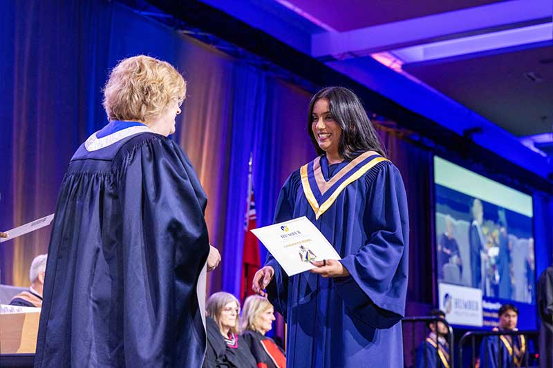 Student receiving diploma
