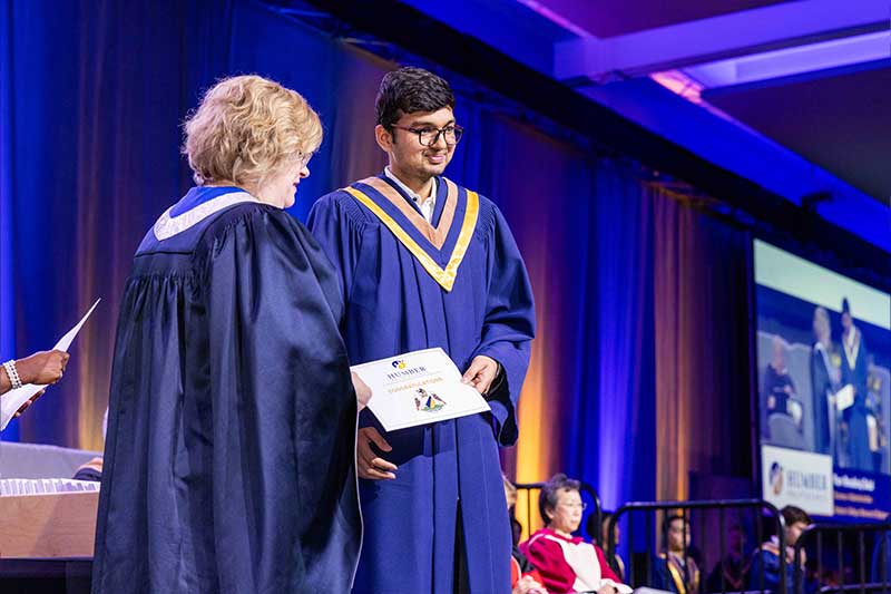 Student receiving diploma