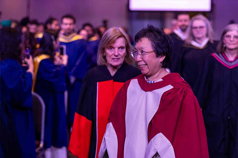 People smiling in the ceremony