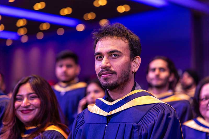 Students smiling at the ceremony