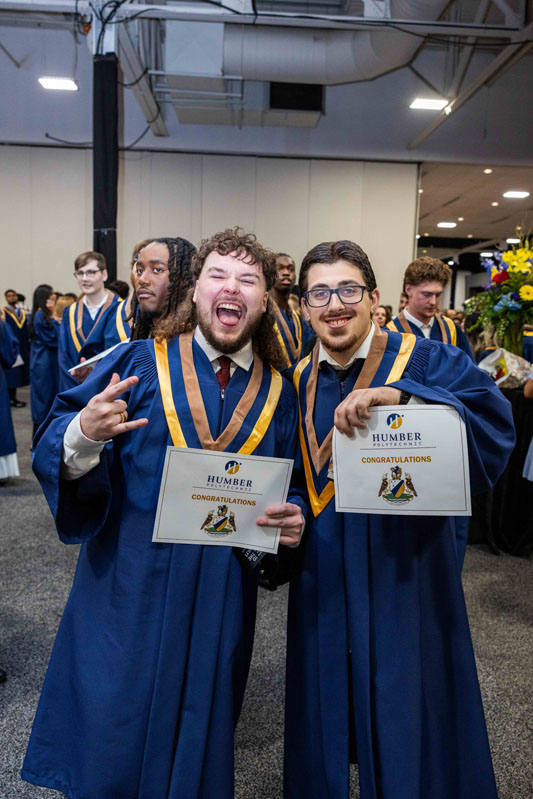 Students holding diploma