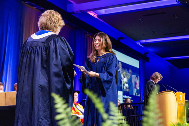 Student Receiving Diploma