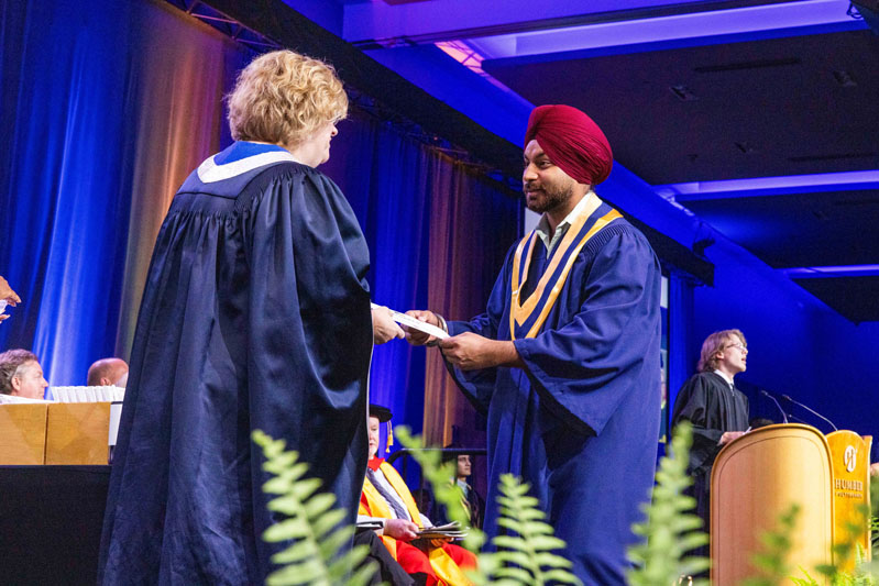 Student Receiving Diploma