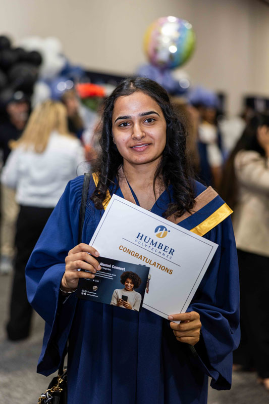 Student holding diploma