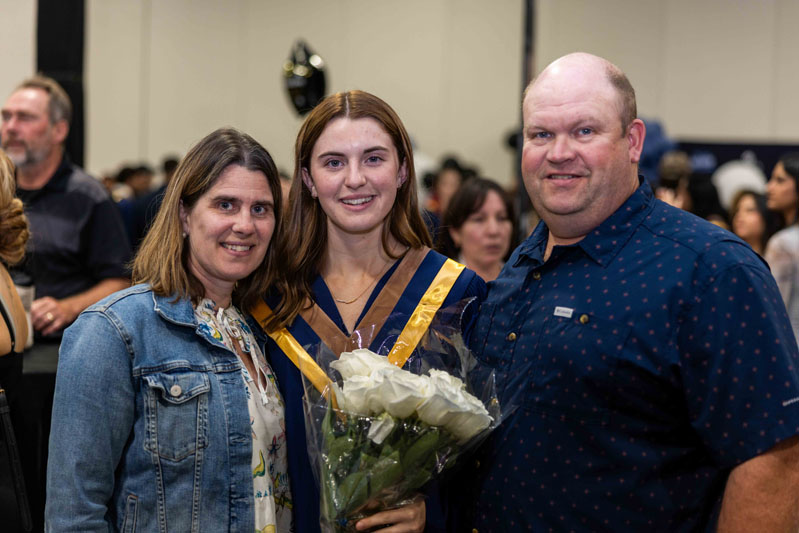 Student and Family Posing for photo