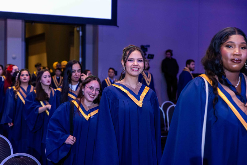 Students smiling in line