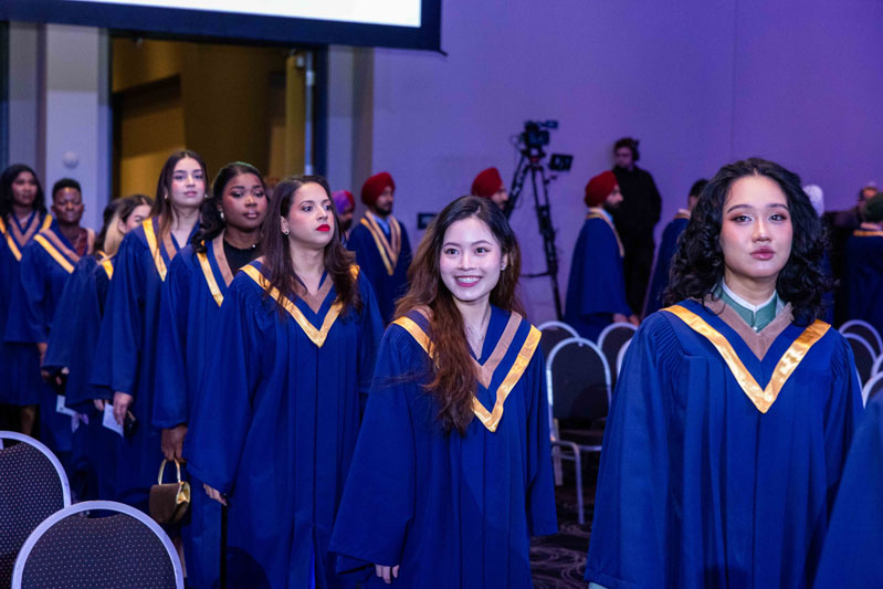 Students smiling in line