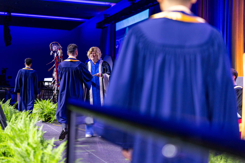 Humber President giving diplomas
