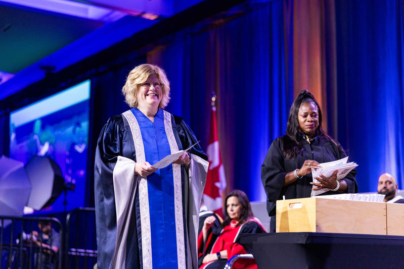 Humber President giving diplomas