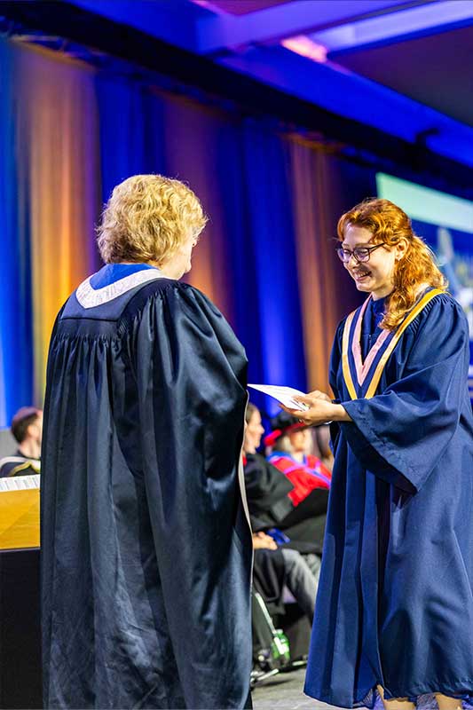 Student Receiving Diploma