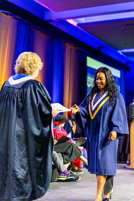 Student Receiving Diploma