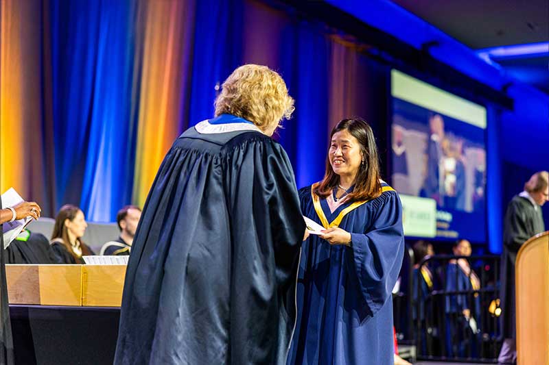 Student Receiving Diploma