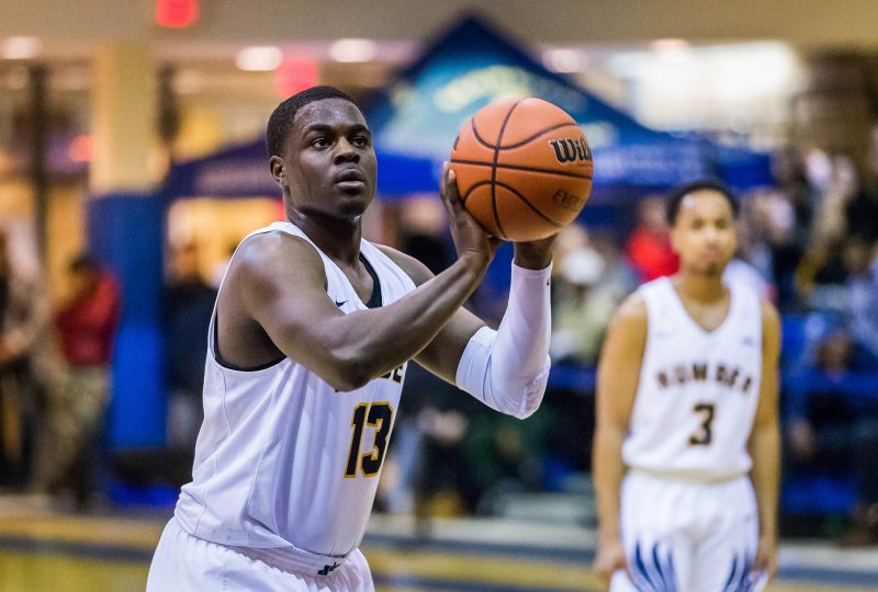 Humber Basketball player about to shoot the ball during a game
