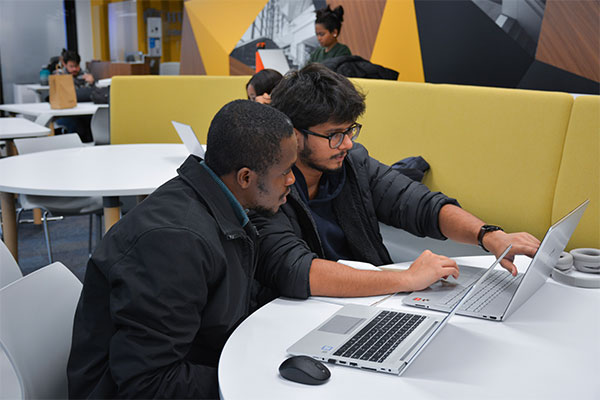 Students working on laptop