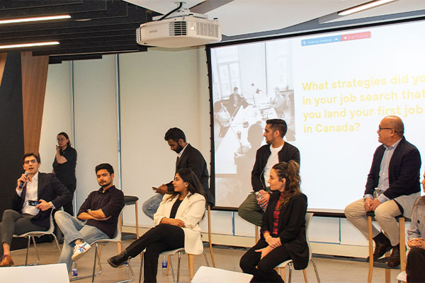 Panel with people speaking