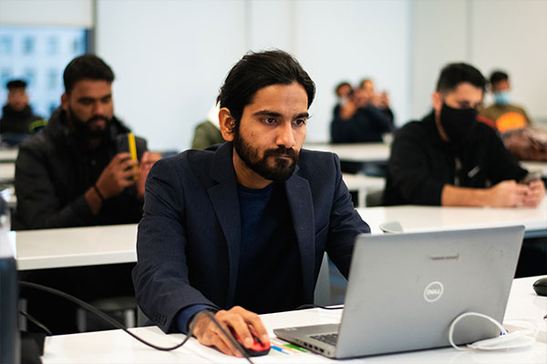 Student looking at computer