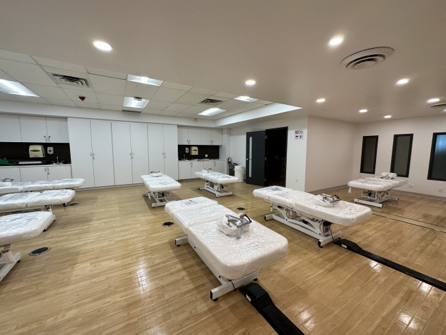 Many brand new massage tables is a spa lab room