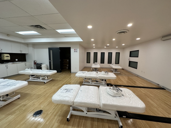 Many brand new massage tables is a spa lab room