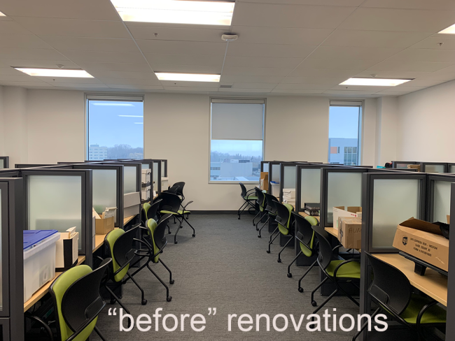 A row of office chars and cublicals with the text "before renovations"
