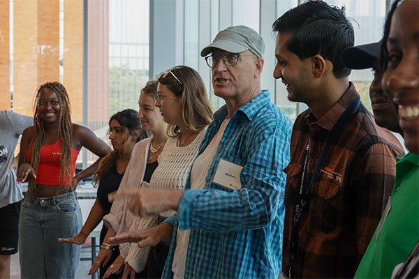 students lined up smiling