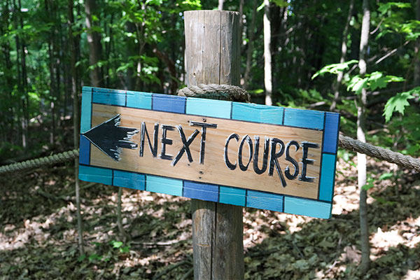 sign that says next course